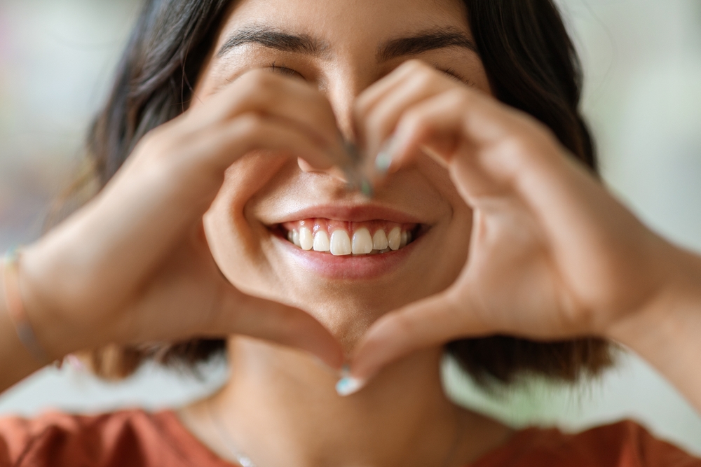 Happy woman after a comfortable dental treatment