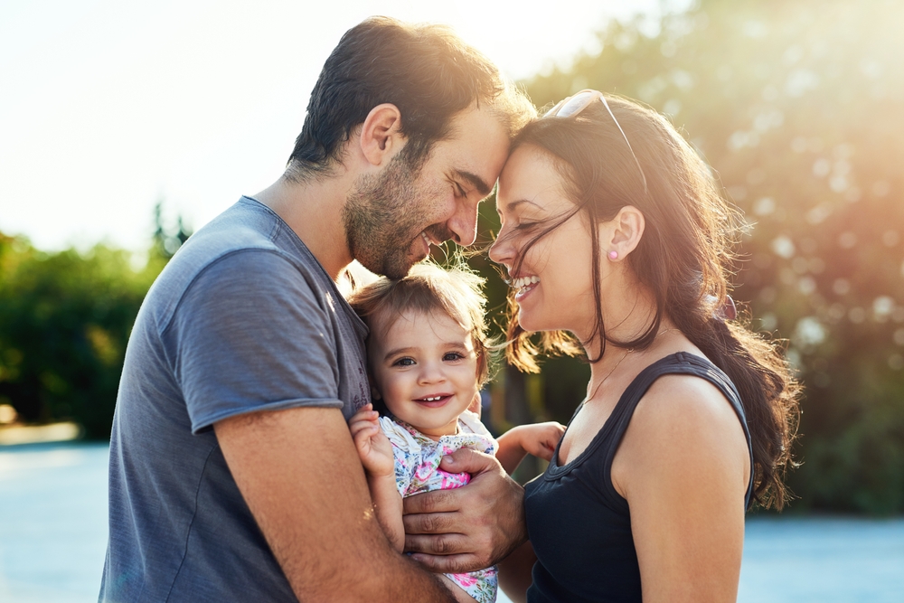 Happy family after Dental Emergency in clinic that cares for patients of all ages