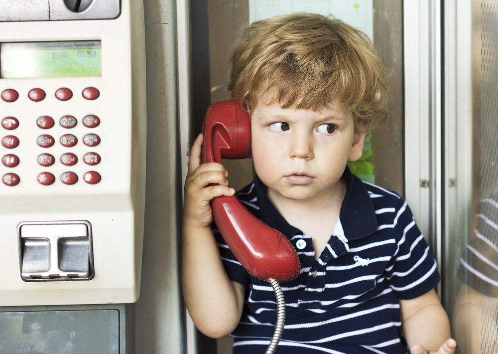 a little kid calling for dental help | caring for patients of all ages